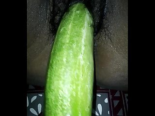 Desi wife eating cucumber